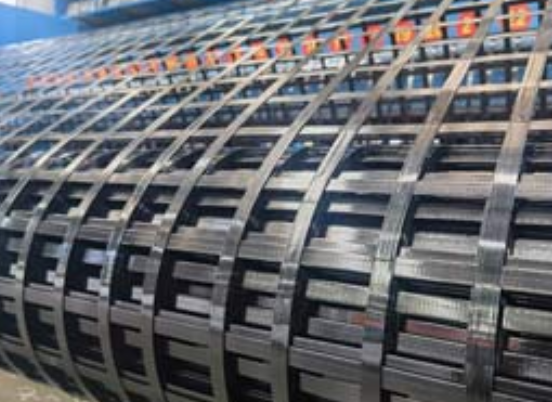 绵竹钢塑土工格栅:基建“隐形脊梁”的绿色智造与长寿命进化论